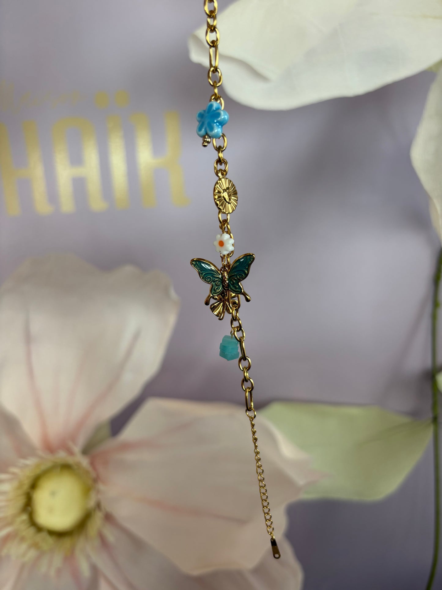 Bracelet breloque papillon bleu