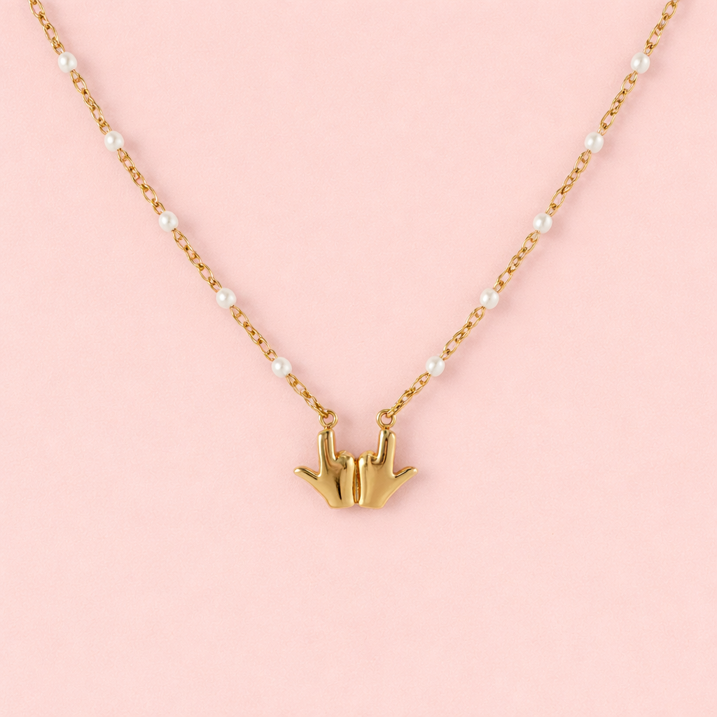 Collier perles du « J »